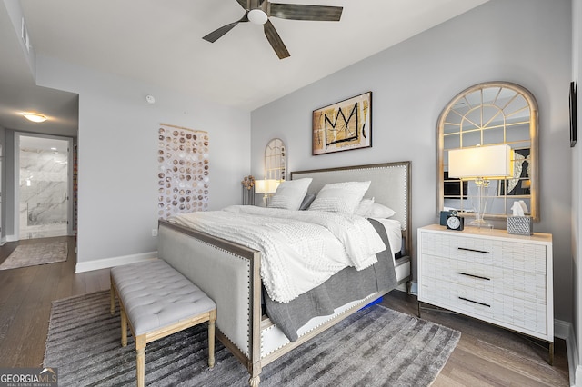 bedroom featuring dark wood-type flooring and ceiling fan