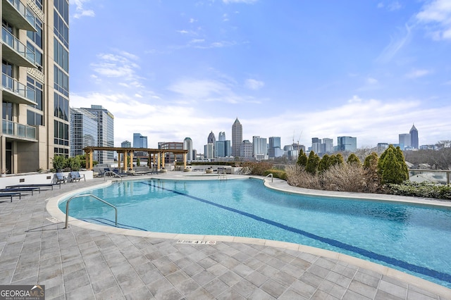 view of pool featuring a patio area