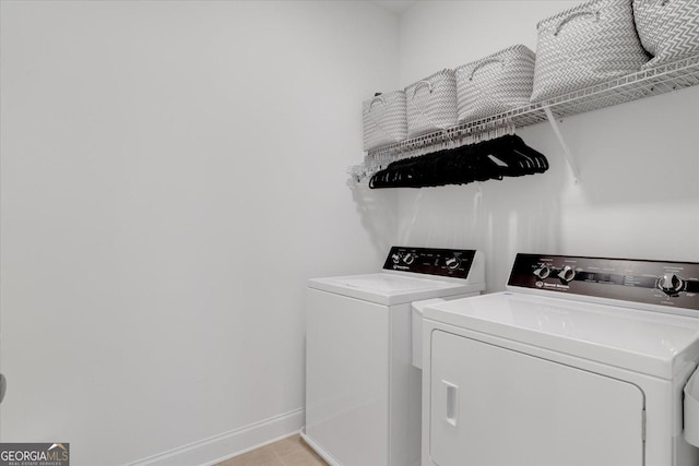 laundry room with washer and dryer