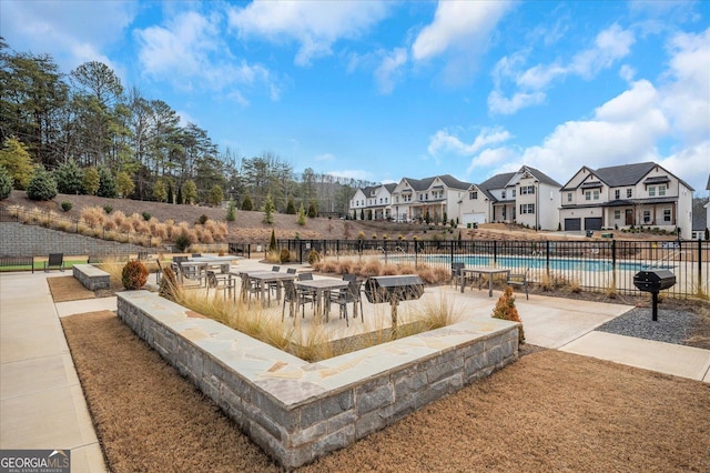 view of property's community with a pool