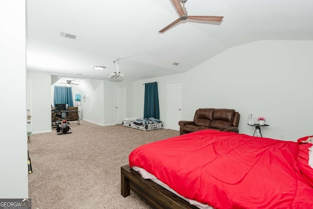 carpeted bedroom with lofted ceiling and ceiling fan