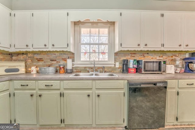 kitchen with tasteful backsplash, black dishwasher, and sink