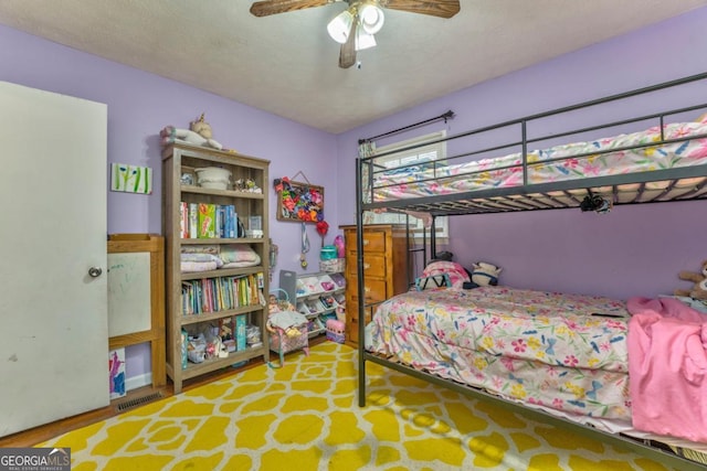 bedroom featuring ceiling fan