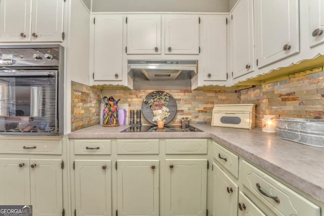 kitchen with white cabinetry, extractor fan, backsplash, and black appliances