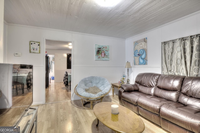 living room with crown molding, wood ceiling, and light hardwood / wood-style flooring