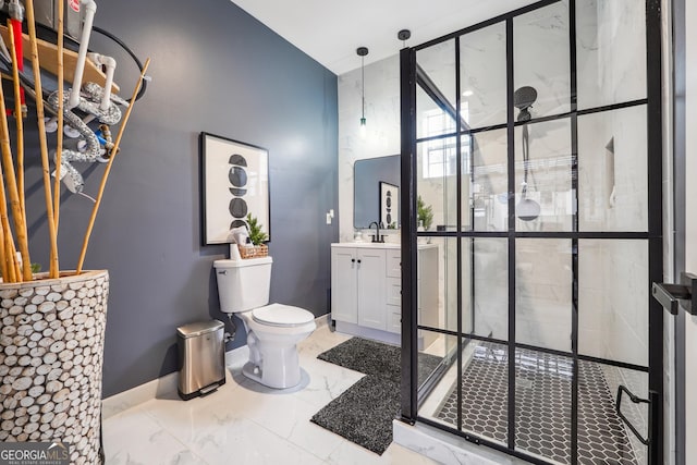 full bath with marble finish floor, toilet, vanity, baseboards, and a stall shower