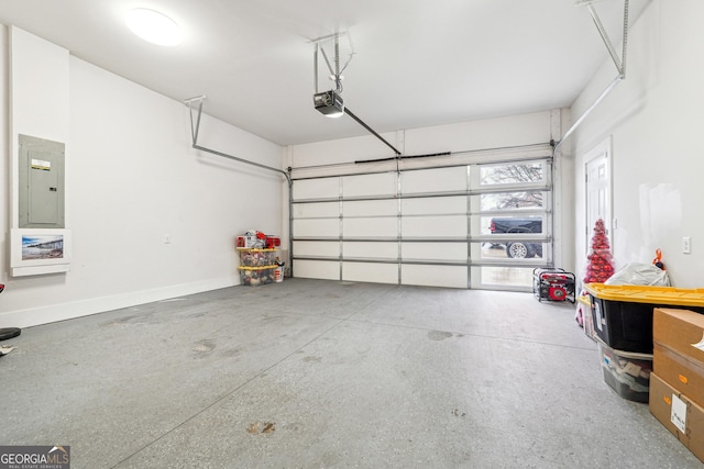 garage with a garage door opener and electric panel