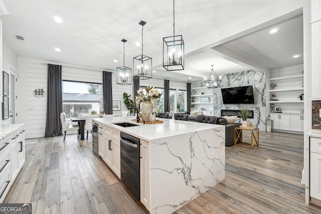 kitchen featuring beverage cooler, recessed lighting, an inviting chandelier, light wood-type flooring, and visible vents