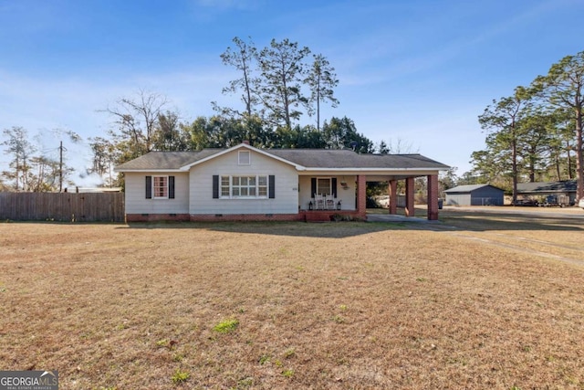 ranch-style home with a porch and a front lawn