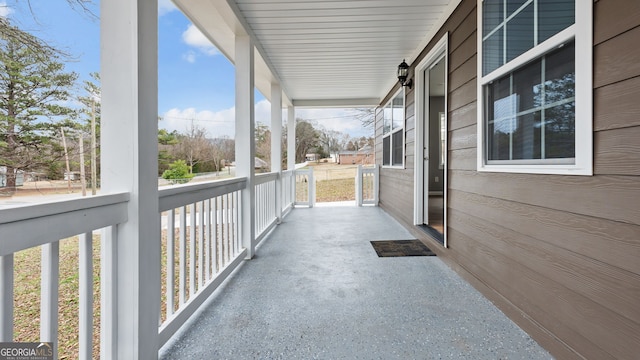 balcony featuring a porch