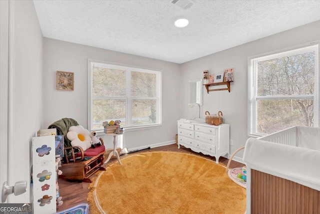 bedroom featuring a textured ceiling