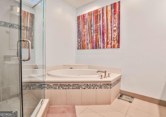 bathroom with tile patterned flooring and plus walk in shower