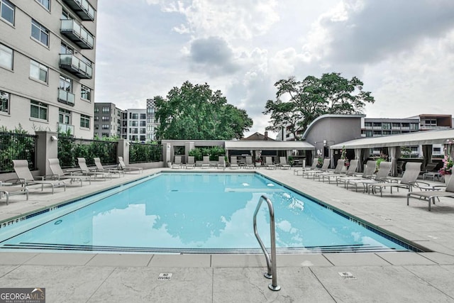 view of pool featuring a patio area