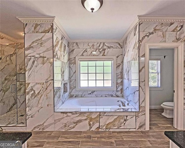 bathroom featuring tile walls, crown molding, independent shower and bath, and toilet