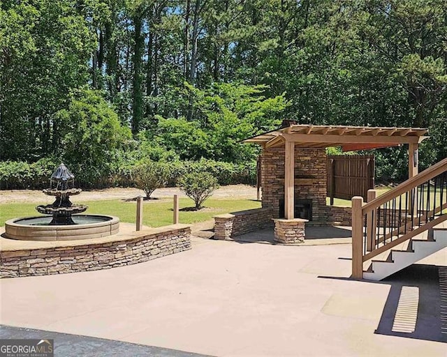 view of patio / terrace featuring a pergola