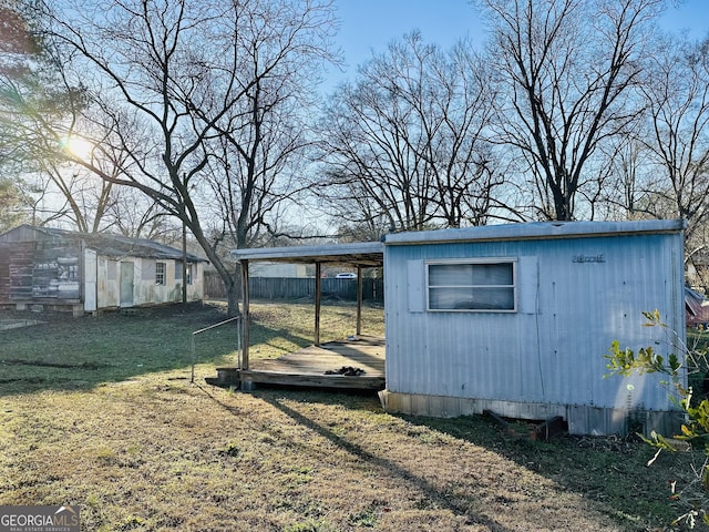 view of outdoor structure featuring a yard