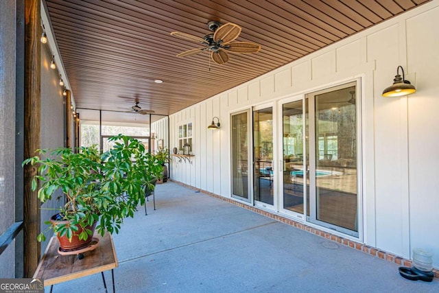 view of patio featuring ceiling fan