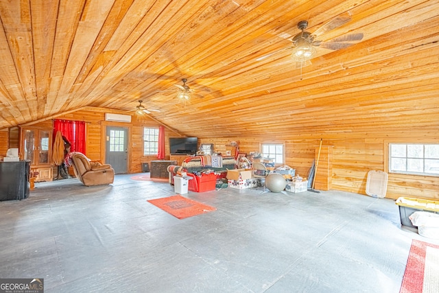 interior space with lofted ceiling, a wall mounted AC, wooden ceiling, and wooden walls