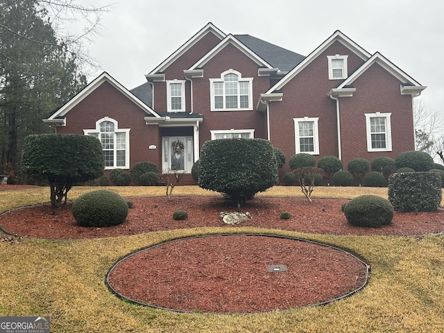 view of front facade with a front yard