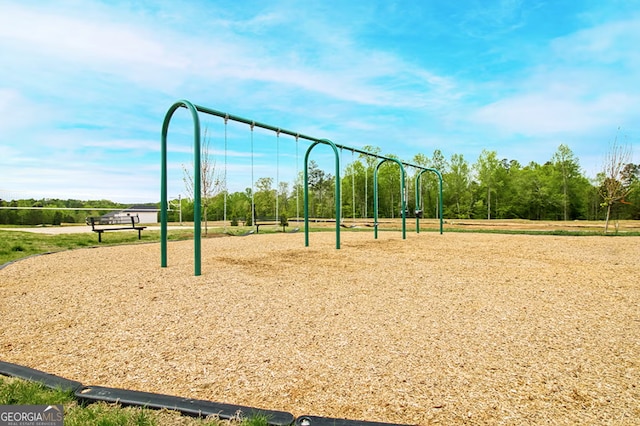 view of home's community with a playground