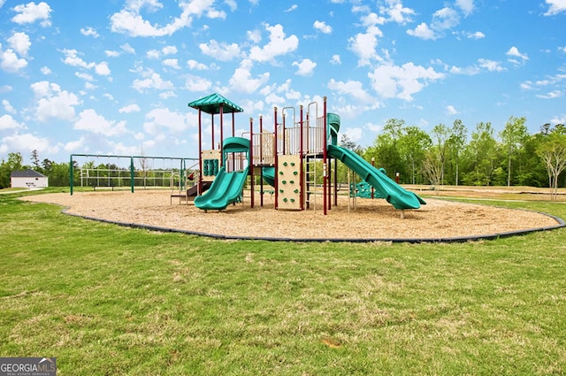 view of play area with a yard