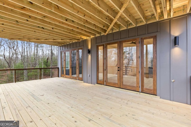 wooden deck featuring french doors