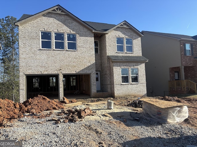 front of property featuring a garage