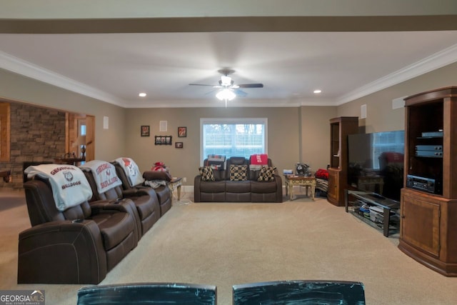 carpeted living room featuring ornamental molding and ceiling fan