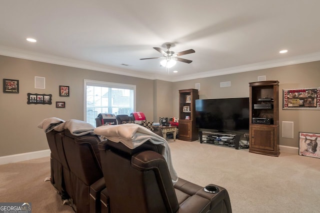 living room with ornamental molding, light carpet, and ceiling fan