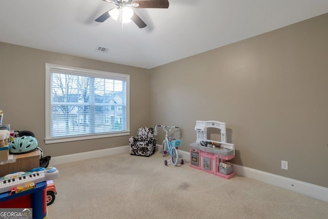 game room featuring carpet floors and ceiling fan