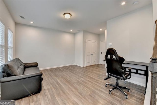 home office featuring light hardwood / wood-style flooring