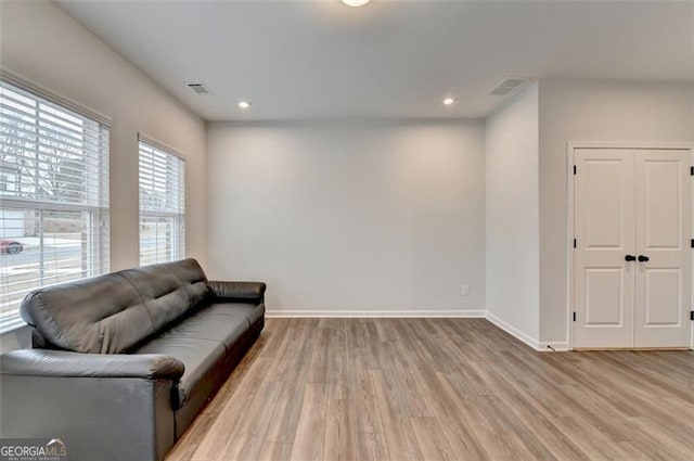 living area featuring hardwood / wood-style flooring