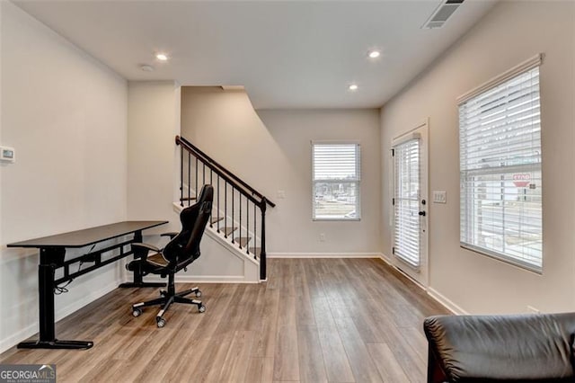 foyer with light wood-type flooring