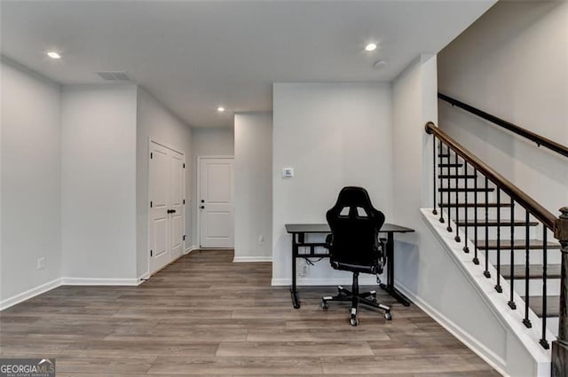 office with wood-type flooring