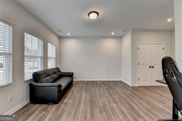 office space with light wood-type flooring