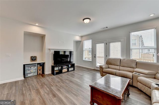 living room featuring light hardwood / wood-style floors