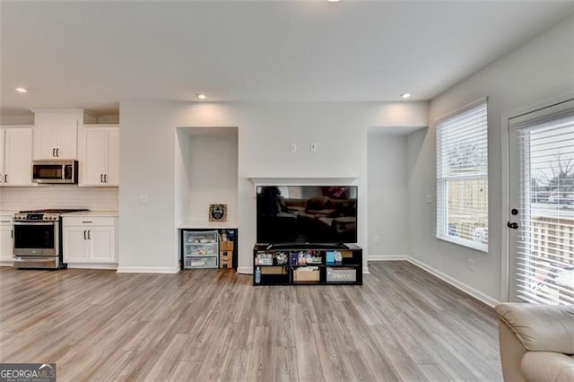 living room featuring light wood-type flooring