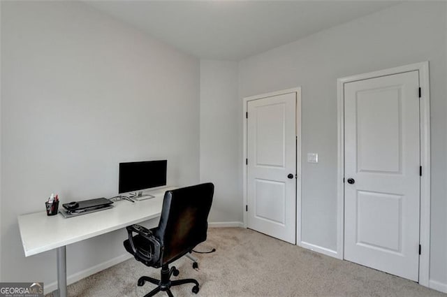 home office with light colored carpet