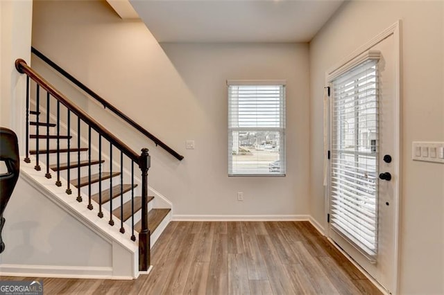 entrance foyer with light hardwood / wood-style flooring