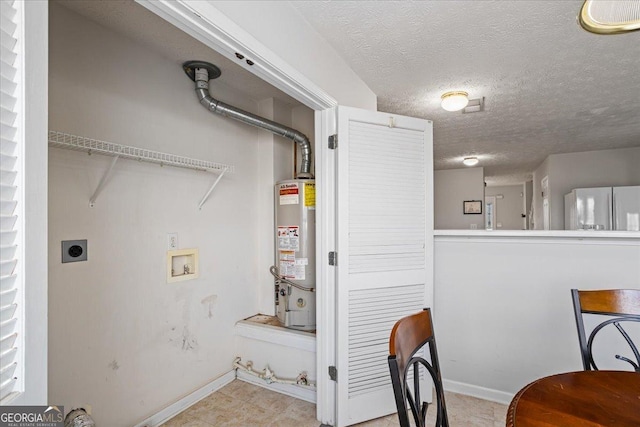 laundry room with washer hookup, electric dryer hookup, water heater, and a textured ceiling