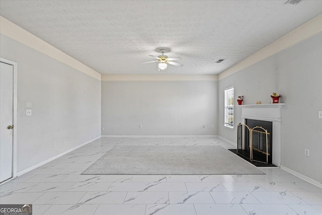 unfurnished living room with a textured ceiling and ceiling fan