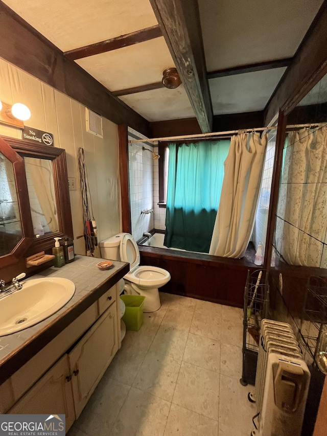 full bathroom with radiator heating unit, shower / bath combination with curtain, vanity, toilet, and beam ceiling