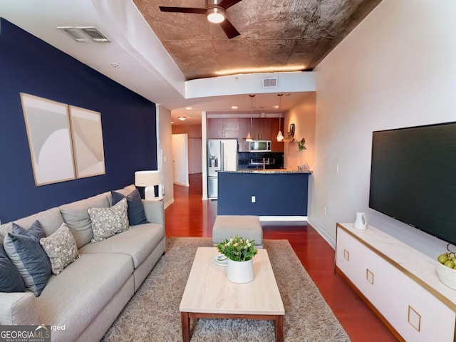 400 W Peachtree St NW Unit 3216, Atlanta, GA 30308 - unfurnished living room featuring visible vents, dark wood finished floors, baseboards, and ceiling fan