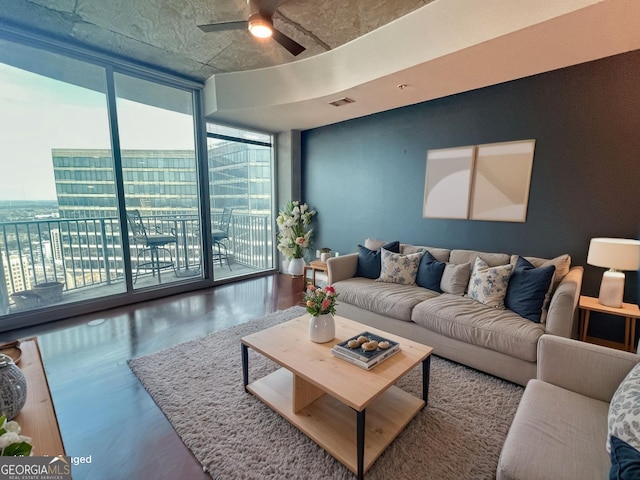 400 W Peachtree St NW Unit 3216, Atlanta, GA 30308 - unfurnished room featuring visible vents, baseboards, ceiling fan, wood finished floors, and expansive windows