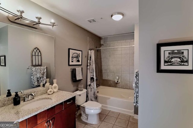400 W Peachtree St NW Unit 3216, Atlanta, GA 30308 - bathroom featuring visible vents, toilet, shower / bath combo with shower curtain, vanity, and tile patterned floors