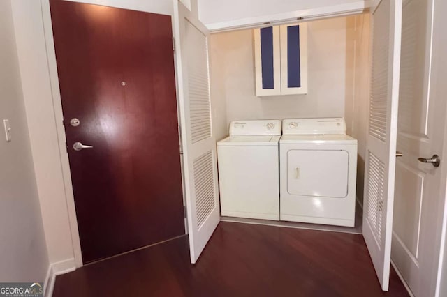 400 W Peachtree St NW Unit 3216, Atlanta, GA 30308 - clothes washing area with dark wood-style floors, washing machine and dryer, and laundry area