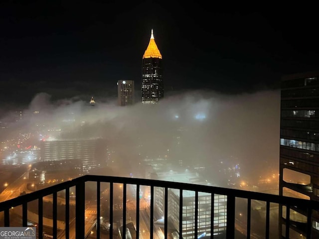 400 W Peachtree St NW Unit 3216, Atlanta, GA 30308 - balcony at night with a view of city lights