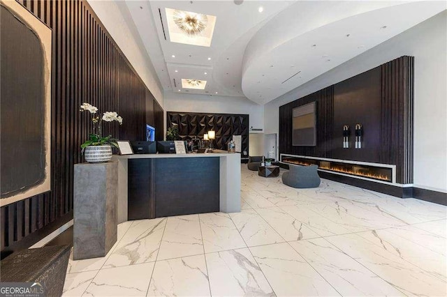 400 W Peachtree St NW Unit 3216, Atlanta, GA 30308 - reception featuring a glass covered fireplace
