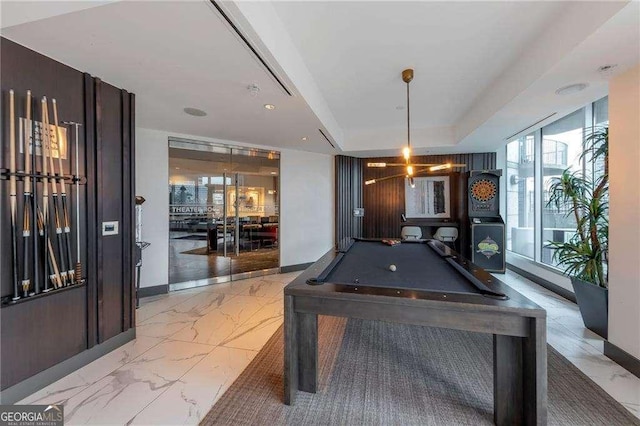 400 W Peachtree St NW Unit 3216, Atlanta, GA 30308 - playroom featuring a raised ceiling, marble finish floor, billiards, and baseboards