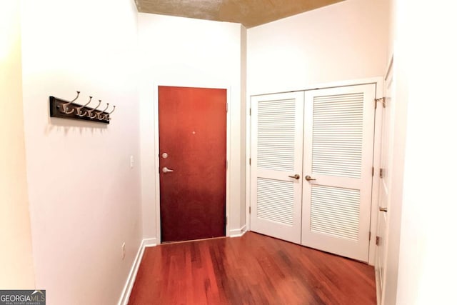 400 W Peachtree St NW Unit 3216, Atlanta, GA 30308 - corridor with baseboards and wood finished floors